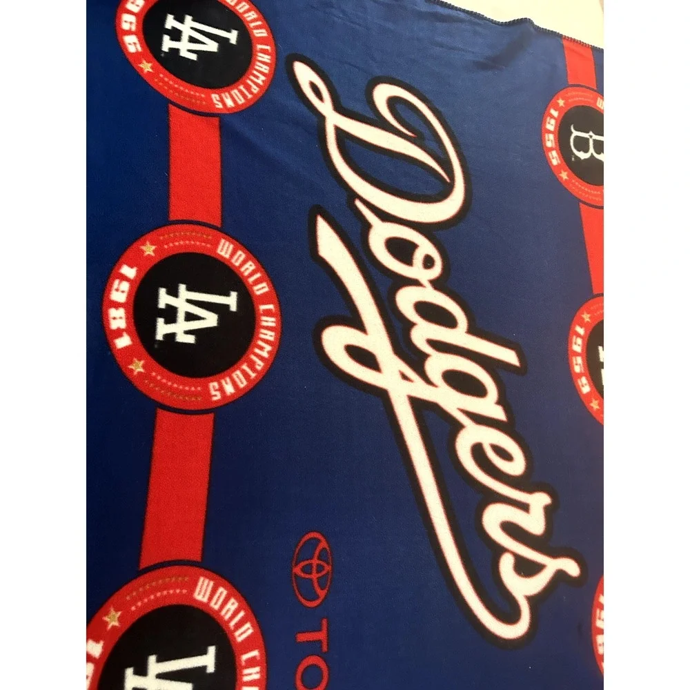 LA Dodgers blanket with logo and list of world series champioships‎